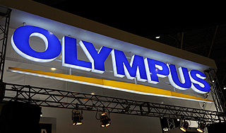 Olympus ������� � ���������� �� $1,7 ����